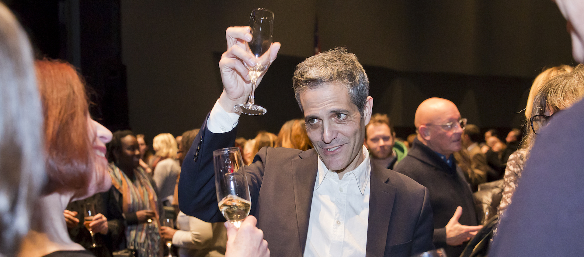 Filmmaker Sam Green has a champagne toast with Wexner Center for the Arts Director Sherri Geldin and the center's Film/Video team following the performance of "A Thousand Thoughts: Sam Green and Kronos Quartet" on January 25, 2018. Photo: Katie Spengler