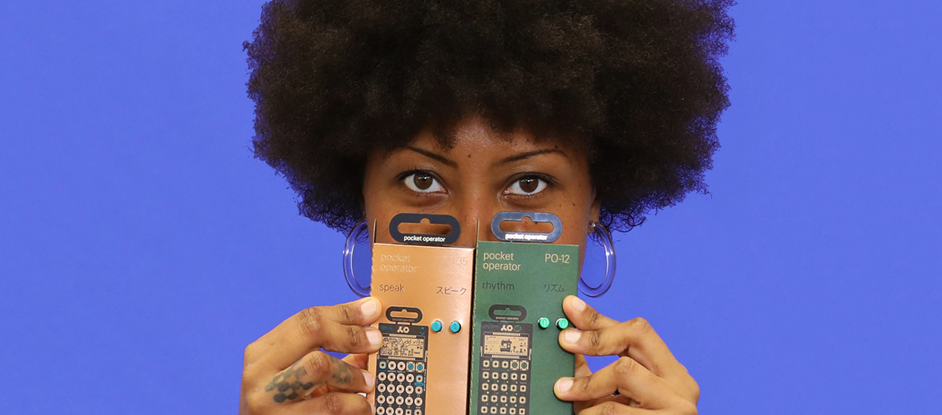 Wexner Center for the Arts House Management staffer Valerie Glenn with holiday gift suggestion of Pocket Operators portable synthesizers by Teenage Engineering