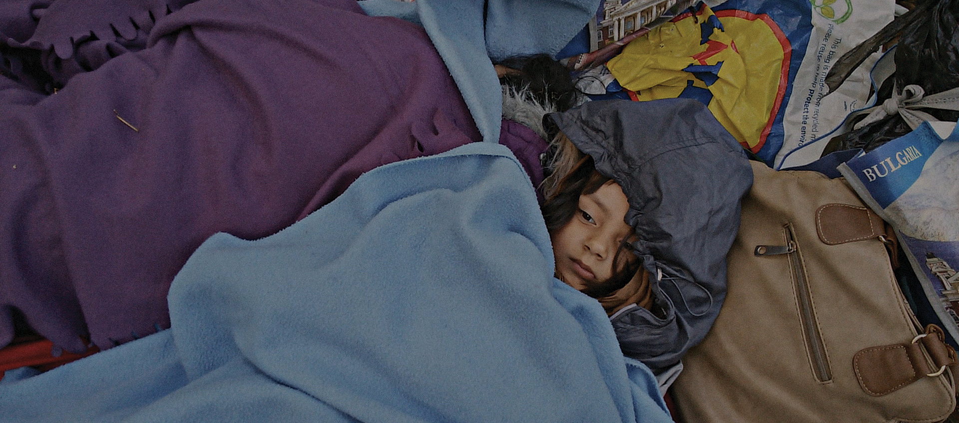 Girl under a blanket, Midnight Traveler
