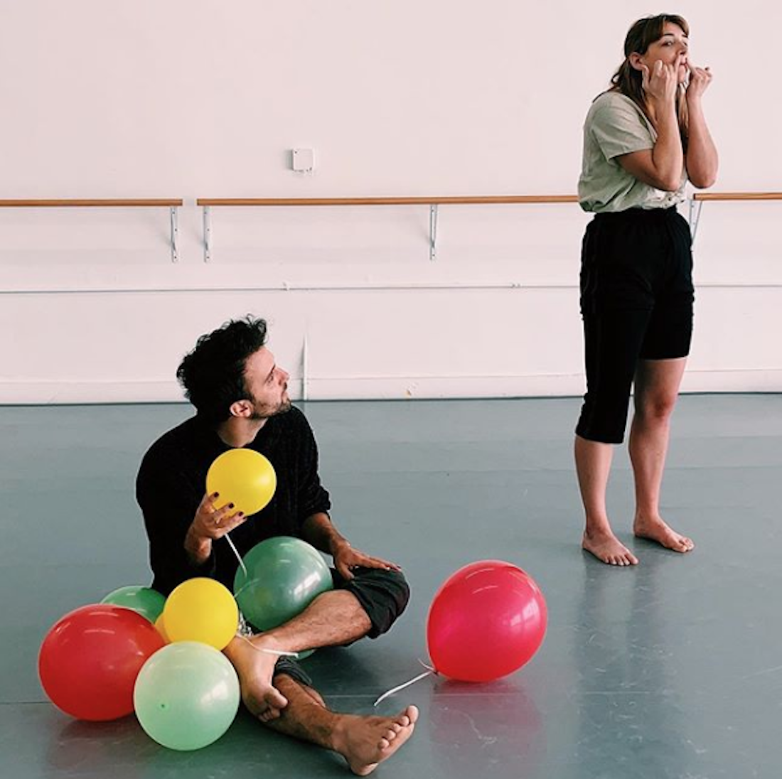 Dancers Filippo Pelacchi and Kelly Hurlburt of FluxFlow Dance Project play with balloons during a rehearsal of FluxFlow's Ursula