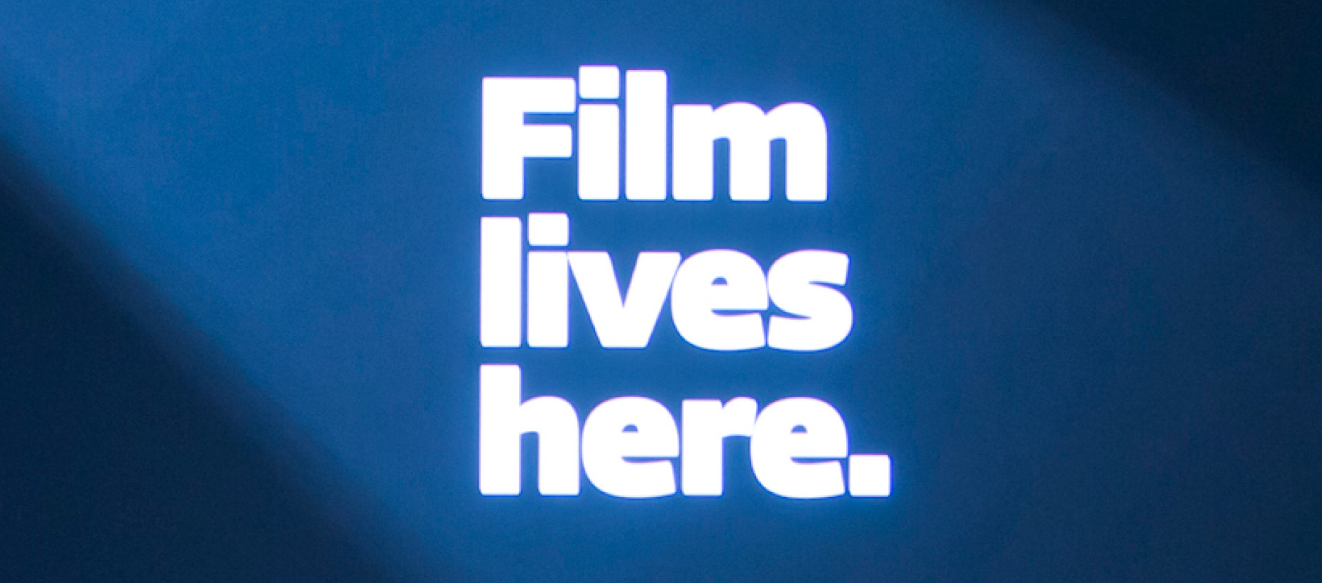 a spotlight on the words film lives here