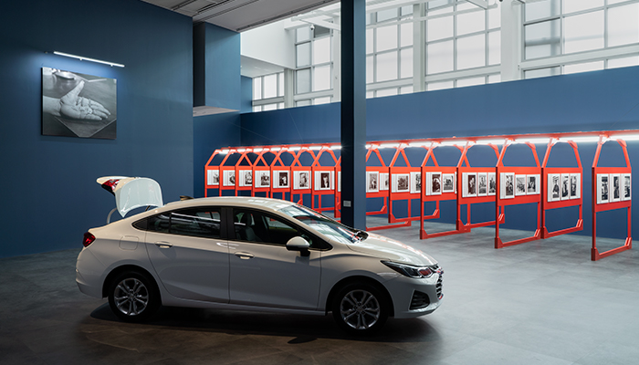 Installation view of the exhibition The Last Cruze by artist LaToya Ruby Frazier, with the last Chevy Cruze to come off the Lordstown, Ohio GM assembly line in the foreground